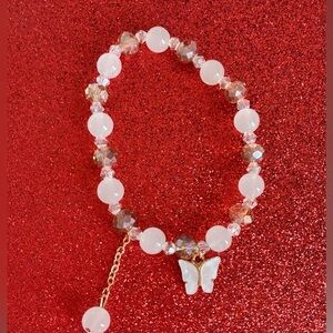 Butterfly charm White glass bead  with stretch braclet